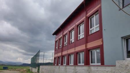 A school made of containers to accommodate flexible amounts of children. 